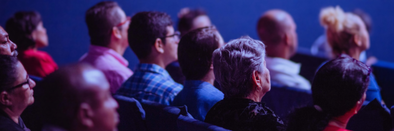 Capital Campaign Masterclass Header: Image of a diverse group of adults sitting 'classroom style' at a seminar.